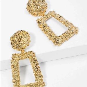 Gold tone earrings